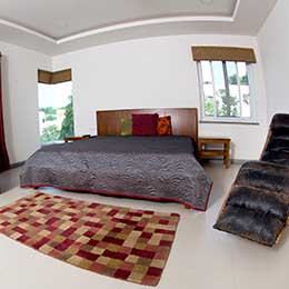 Bedroom: Airy and spacious bedroom covered in exquisite linen at Concord Valley View Serviced Apartment