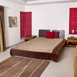 Bedroom: A cosy bed set and splendid curtains give the bed room an unmatched feeling of luxury at Concord Valley View Serviced Apartment